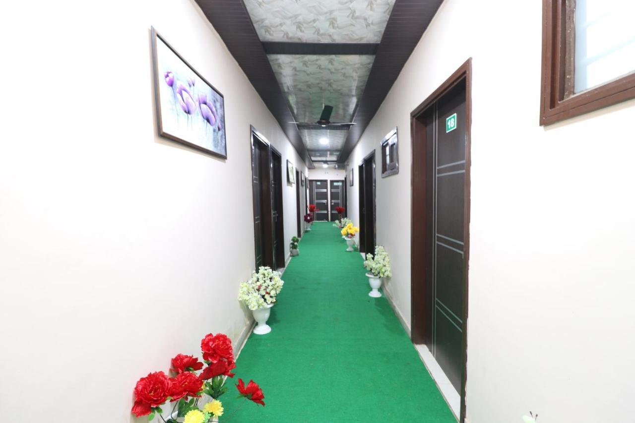 Oyo 28338 New Life Hotel Banur Bagian luar foto