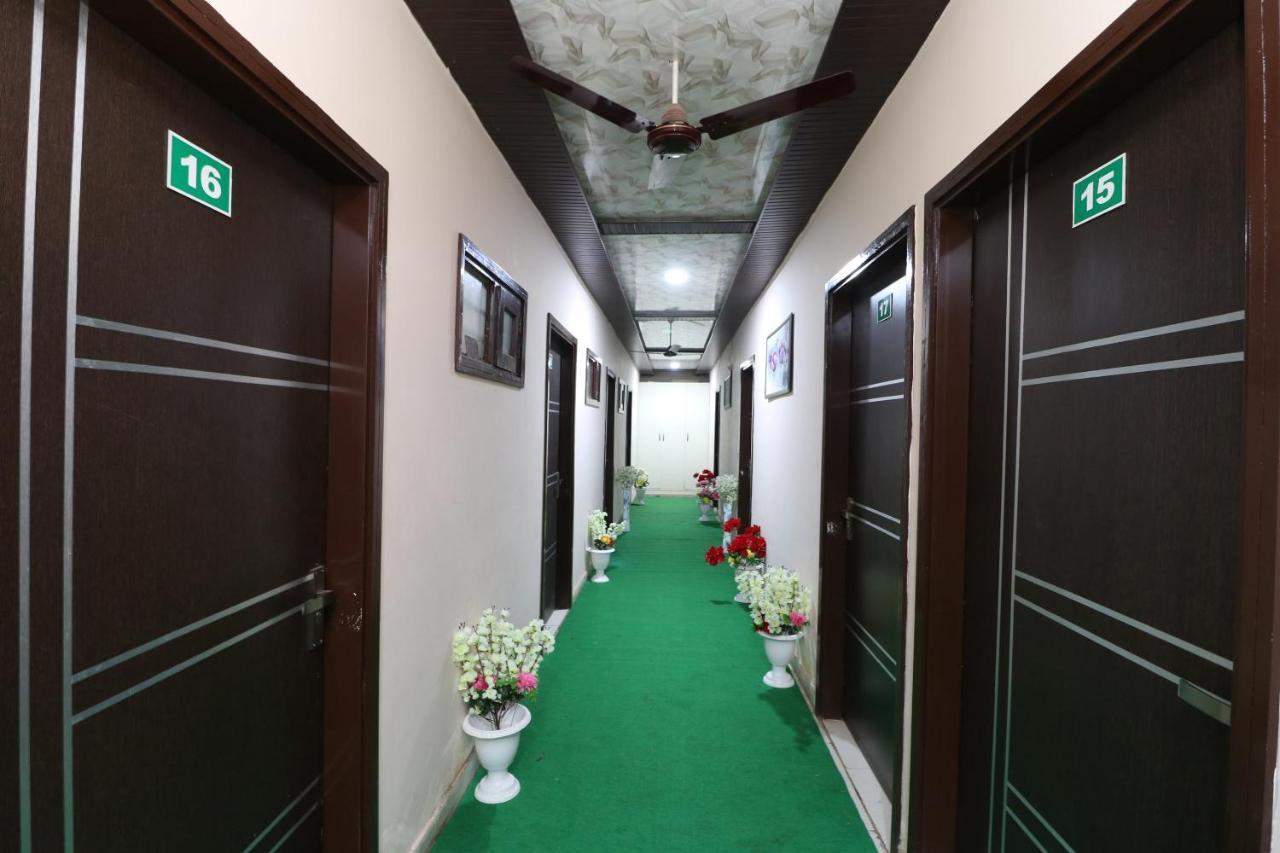 Oyo 28338 New Life Hotel Banur Bagian luar foto